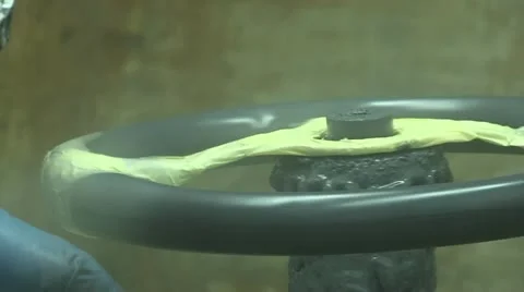 Steering wheel being painted Stock Footage 22413813