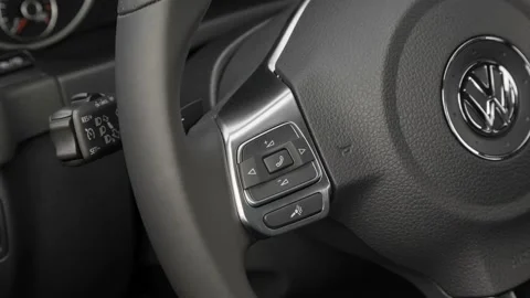 Steering wheel control buttons close up 2016 Volkswagen Tiguan R-Line Video stock 159856169