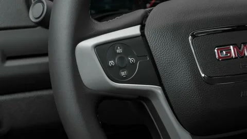 Steering wheel control buttons close up 2016 GMC Canyon SLE Stock Footage 159863167