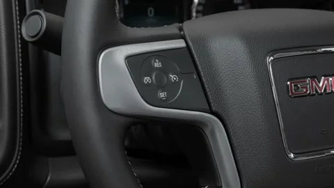 Steering wheel control buttons close up 2016 GMC Sierra 1500 SLT Stock Footage 159866892