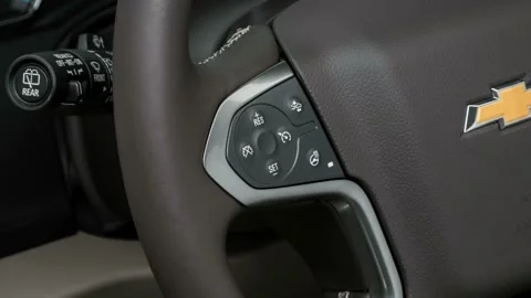 Steering wheel control buttons close up 2016 Chevrolet Tahoe LTZ Stock Footage 159888182