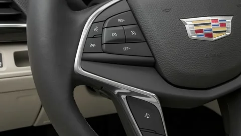 Steering wheel control buttons close up 2016 Cadillac CT6 Stock Footage 159889942