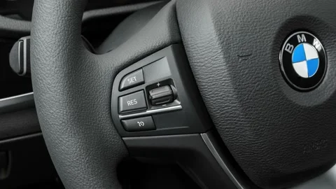 Steering wheel control buttons close up 2017 BMW X3 xDrive28i Video stock 159900186