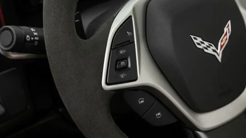 Steering wheel control buttons close up 2017 Chevrolet Corvette Grand Sport 3LT Video stock 159905599