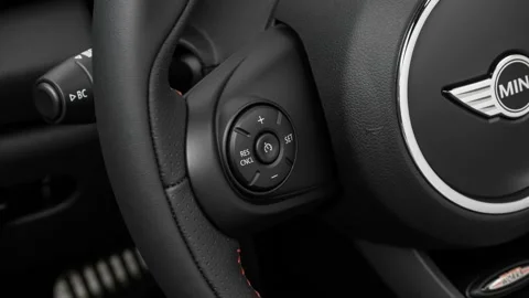 Steering wheel control buttons close up 2017 Mini Hardtop 2 Door Cooper S Stock Footage 159907821