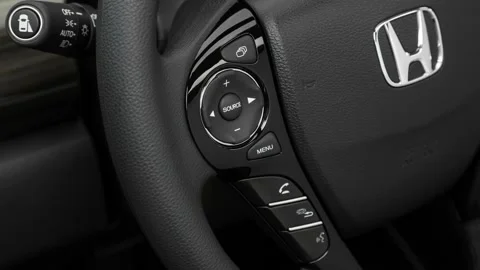Steering wheel control buttons close up 2017 Honda Accord EX Stock Footage 159913555