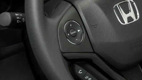Steering wheel control buttons close up 2017 Honda HR-V LX Stock Footage 159917448