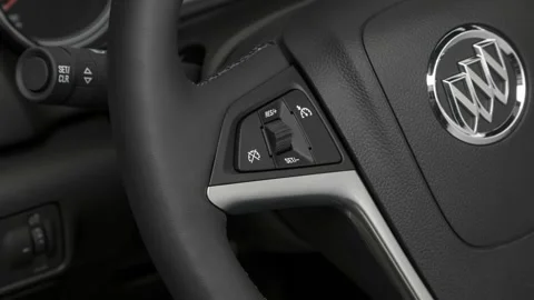 Steering wheel control buttons close up 2017 Buick Cascada Stock Footage 159923403