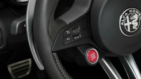 Steering wheel control buttons close up 2017 Alfa Romeo Giulia Quadrifoglio Stock Footage 159931210