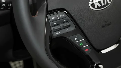 Steering wheel control buttons close up 2017 Kia Forte5 SX Stock Footage 159932445