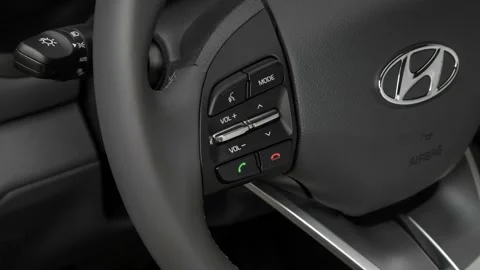 Steering wheel control buttons close up 2017 Hyundai Ioniq Hybrid SEL Stock Footage 159938112