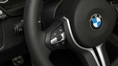 Steering wheel control buttons close up 2017 BMW 3-series M3 Video stock 159939656