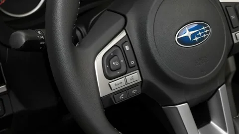 Steering wheel control buttons close up 2018 Subaru Forester Black Edition Stock Footage 159946115