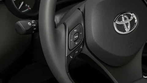 Steering wheel control buttons close up 2018 Toyota C-HR XLE Stock Footage 159948408