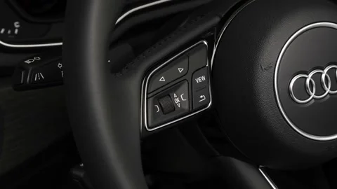 Steering wheel control buttons close up 2018 Audi A5 Prestige 2.0 TFSI Stock Footage 159957803