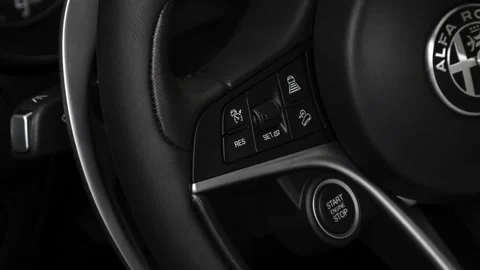 Steering wheel control buttons close up 2018 Alfa Romeo Stelvio Ti Sport AWD Video stock 159970187