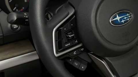 Steering wheel control buttons close up 2018 Subaru Outback 3.6R Touring Stock Footage 159970633