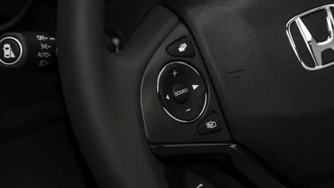 Steering wheel control buttons close up 2018 Honda HR-V EX-L Navi Stock Footage 159972096