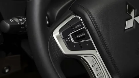 Steering wheel control buttons close up 2018 Mitsubishi Outlander PHEV SEL S-AWC Stock Footage 159994438