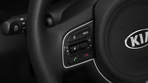 Steering wheel control buttons close up 2018 Kia Optima Plug-In Hybrid EX Stock Footage 159995220