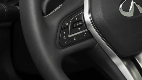 Steering wheel control buttons close up 2019 Infiniti QX50 Essential Stock Footage 160005374