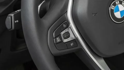 Steering wheel control buttons close up 2019 BMW X3 sDrive30i Stock Footage 160011991