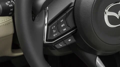 Steering wheel control buttons close up 2018 Mazda MAZDA6 Touring Stock Footage 160012182