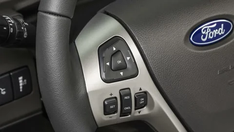 Steering wheel control buttons close up 2019 Ford Flex Limited Stock Footage 160020749
