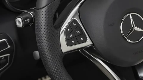 Steering wheel control buttons close up 2019 Mercedes-Benz GLC-Class GLC300 Stock Footage 160026387