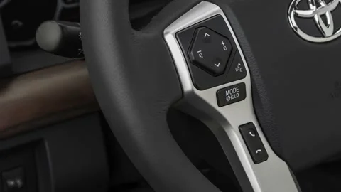 Steering wheel control buttons close up 2019 Toyota Tundra Limited Stock Footage 160028023