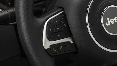 Steering wheel control buttons close up 2019 Jeep Compass Sport Video stock 160032007