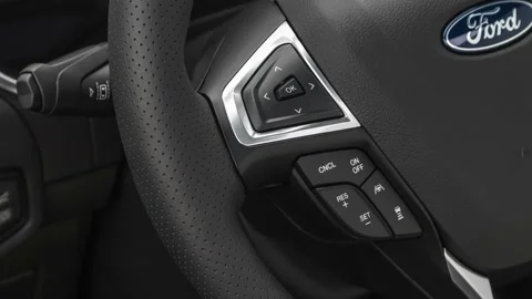 Steering wheel control buttons close up 2019 Ford Edge ST Stock Footage 160042207