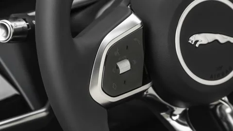 Steering wheel control buttons close up 2019 Jaguar I-Pace EV400 SE Stock Footage 160050199