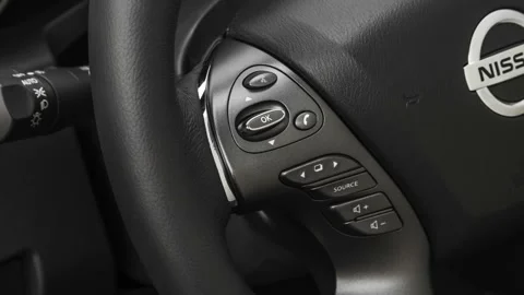 Steering wheel control buttons close up 2019 Nissan Murano Platinum Stock Footage 160058398
