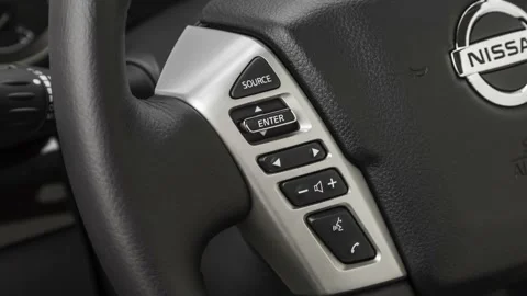 Steering wheel control buttons close up 2019 Nissan Titan SV Stock Footage 160058497