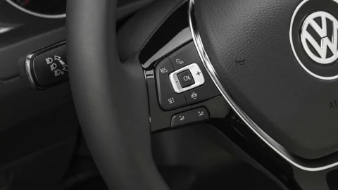 Steering wheel control buttons close up 2019 Volkswagen Golf S Stock Footage 160058736