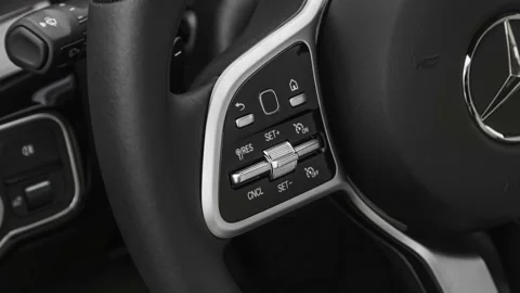 Steering wheel control buttons close up 2019 Mercedes-Benz A-Class A220 Stock Footage 160059578