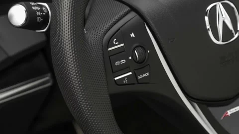 Steering wheel control buttons close up 2019 Acura MDX with A-Spec Package Stock Footage 160069149