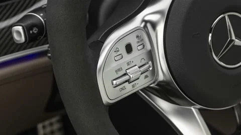 Steering wheel control buttons close up 2019 Mercedes-Benz AMG GT AMG GT 63 Stock Footage 160073782