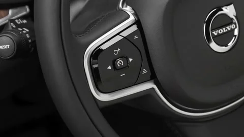 Steering wheel control buttons close up 2020 Volvo V60 T5 Momentum Stock Footage 160084699