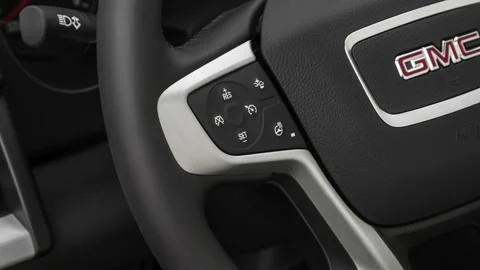 Steering wheel control buttons close up 2020 GMC Terrain SLT Stock Footage 160086490