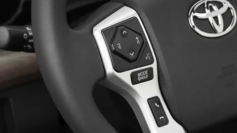 Steering wheel control buttons close up 2020 Toyota Tundra Limited Stock Footage 160089410