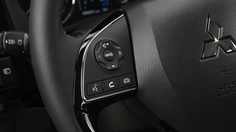 Steering wheel control buttons close up 2020 Mitsubishi Outlander SE 2.4 Stock Footage 160091064