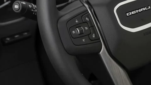 Steering wheel control buttons close up 2020 GMC Sierra 3500HD Denali Stock Footage 160091615