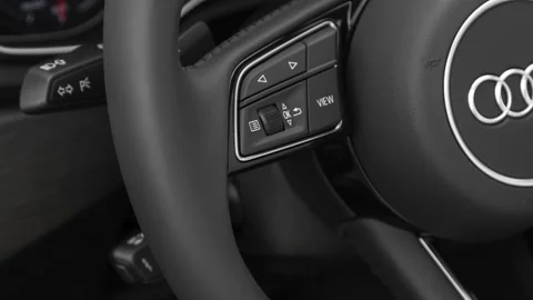 Steering wheel control buttons close up 2020 Audi A4 Premium 40 TFSI Stock Footage 160108734