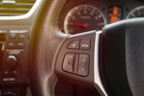 Steering wheel control buttons on the steering wheel Stock Photos