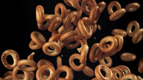 The steering wheel crackers rise and fall on a black background. Filmed on a Stock Footage 322798899