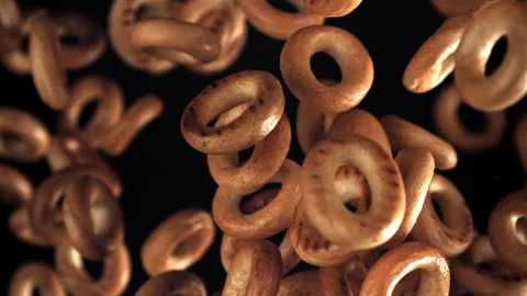 The steering wheel crackers rise and fall on a black background. Filmed on a Stock Footage 322800164