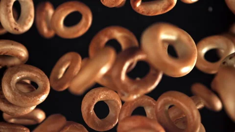 The steering wheel crackers rise and fall on a black background. Filmed on a Stock Footage 322813485