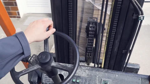 Steering wheel in forklift loader cabin Stock Footage 131127580